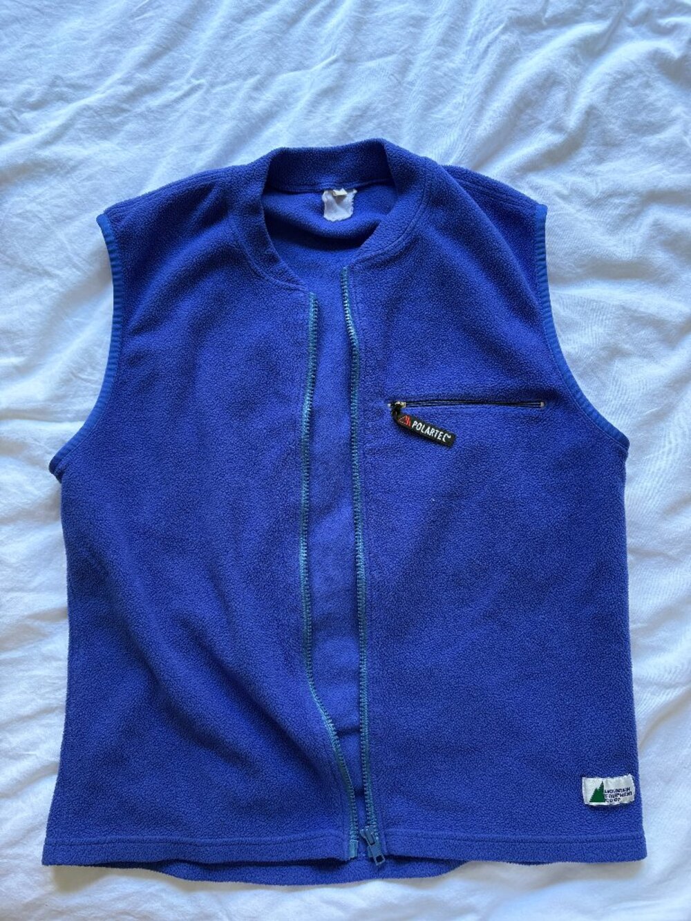 bright blue fleece vest